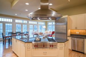 a kitchen with a stove top oven in a room at The Shire Woodstock in Woodstock