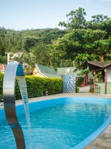 The swimming pool at or close to Pousada Ilha da Magia