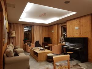 Posezení v ubytování Hotel Pedretti