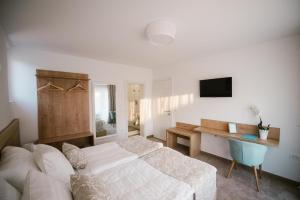 TV a/nebo společenská místnost v ubytování 2I rooms