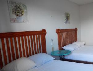 Cama ou camas em um quarto em Blue Coconut Cancun Hotel