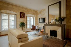 Μια τηλεόραση ή/και κέντρο ψυχαγωγίας στο Nona Home Bordeaux