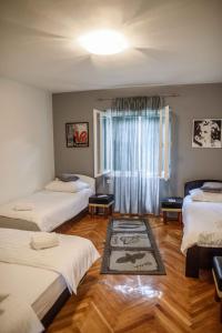 Postel nebo postele na pokoji v ubytování Apartment/Room ''Dalmacija'' SINJ