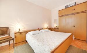 Łóżko lub łóżka w pokoju w obiekcie Apartments Andela