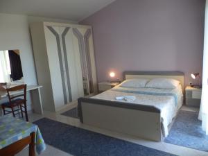Łóżko lub łóżka w pokoju w obiekcie Apartments Andela