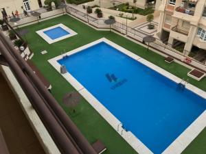 Fotografia z galérie ubytovania Apartamento Teatinos con piscina espectacular, aire acondicionado en salón-comedor y ventiladores en habitaciones v destinácii Málaga