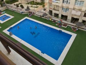 Fotografia z galérie ubytovania Apartamento Teatinos con piscina espectacular, aire acondicionado en salón-comedor y ventiladores en habitaciones v destinácii Málaga