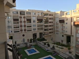Fotografia z galérie ubytovania Apartamento Teatinos con piscina espectacular, aire acondicionado en salón-comedor y ventiladores en habitaciones v destinácii Málaga