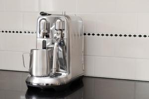 a silver coffee maker on a counter in a kitchen at Poet's Cottage - Fireplace, Close to Treks in Wentworth Falls