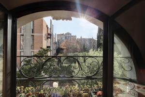 a view from a window of a balcony at Nobile House in Venice