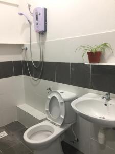 Ένα μπάνιο στο Cameron Prima Apartment @ Cameron Jaya