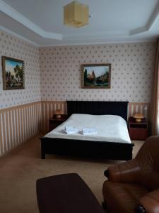 Postel nebo postele na pokoji v ubytování LidoLux