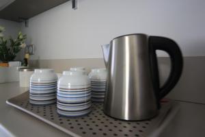 Facilități de preparat ceai și cafea la Maison Cube
