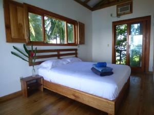 Cama o camas de una habitación en Casa Basti-Hill
