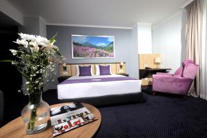 Ένα ή περισσότερα κρεβάτια σε δωμάτιο στο Mercure Tetovo +81 φωτογραφίες