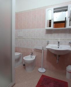 Koupelna v ubytování Da Donna Rosa