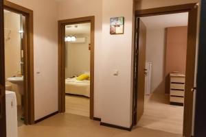 A bed or beds in a room at PM Mountain View Fireside Retreat Bansko