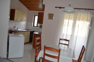 Kuchyň nebo kuchyňský kout v ubytování Apartments Lera