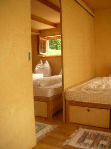 Postel nebo postele na pokoji v ubytování Rifugio Bernhard