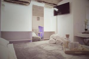 Μια τηλεόραση ή/και κέντρο ψυχαγωγίας στο Puglia Loving Room