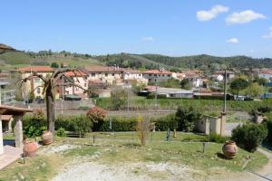 a view of a town with houses and a city at Villa La Meridiana in Luciana