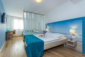 Postel nebo postele na pokoji v ubytování Hotel Vista