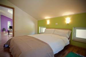 Postel nebo postele na pokoji v ubytování Apartments Soča