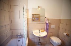 Koupelna v ubytování Apartments Soča