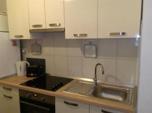 Kuchyňa alebo kuchynka v ubytovaní Apartman Radošić