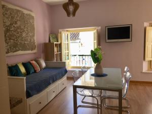 Telewizja i/lub zestaw kina domowego w obiekcie NATURA SUITE MÁLAGA