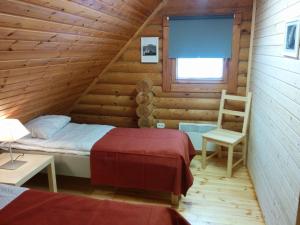 Postel nebo postele na pokoji v ubytování Safari House