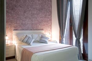 Postel nebo postele na pokoji v ubytování Aparthotel Rambla108