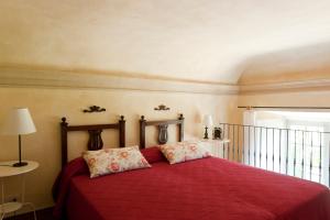 Posteľ alebo postele v izbe v ubytovaní Castello di Rocca Grimalda