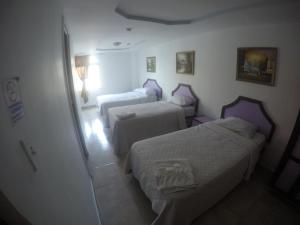 Cama o camas de una habitación en Backpacker Inn