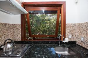 Vonios kambarys apgyvendinimo įstaigoje Recanto dos Passaros