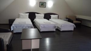 Postel nebo postele na pokoji v ubytování Hotel Enchevi