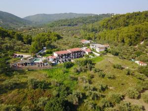 an aerial view of a resort in the mountains at Skiathos Argento in Kolios