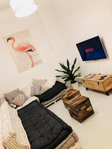 Televízia a/alebo spoločenská miestnosť v ubytovaní White Loft Alicante