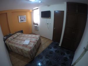 Postel nebo postele na pokoji v ubytování Hotel Villa del Mar