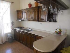 Kuchyň nebo kuchyňský kout v ubytování Apartamento Frente Al Mar