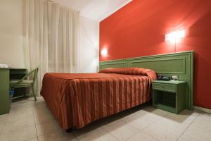 Letto o letti in una camera di Hotel Villa Molinari