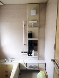 Kylpyhuone majoituspaikassa EN Guest house