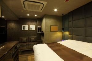 Postel nebo postele na pokoji v ubytování Hotel Waltz Okazaki (Adult Only)