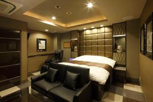 Postel nebo postele na pokoji v ubytování Hotel Waltz Okazaki (Adult Only)