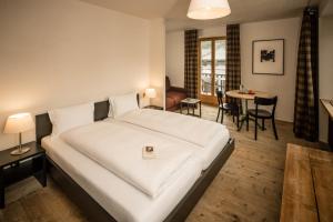Letto o letti in una camera di Pensiun Aldier
