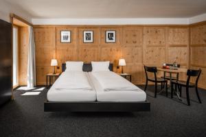 Letto o letti in una camera di Pensiun Aldier