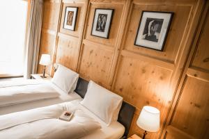 Letto o letti in una camera di Pensiun Aldier
