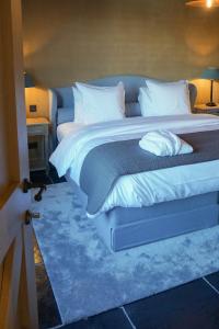 Postel nebo postele na pokoji v ubytování Boutique Hotel De Brakelhoen