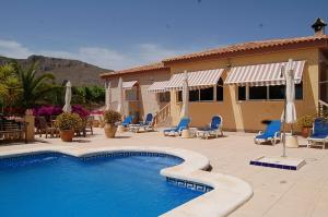 Bazén v ubytovaní Finca Vista Valle alebo v jeho blízkosti