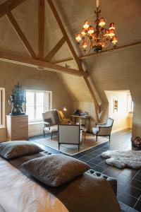 Posezení v ubytování Boutique Hotel De Brakelhoen